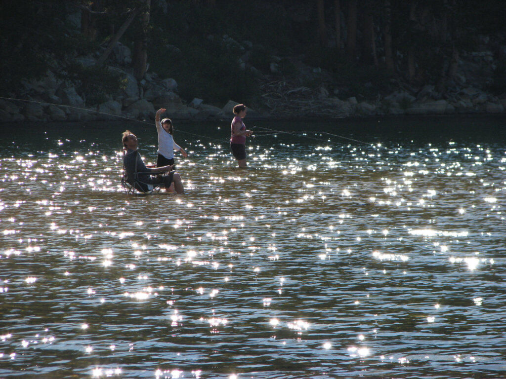 A Southern Oregon photo manager shares a family photo of a vacation moment in a glistening lake.
